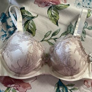 34D Felina Bra New with tags. Beautiful soft satiny feeling cups lightly lined.